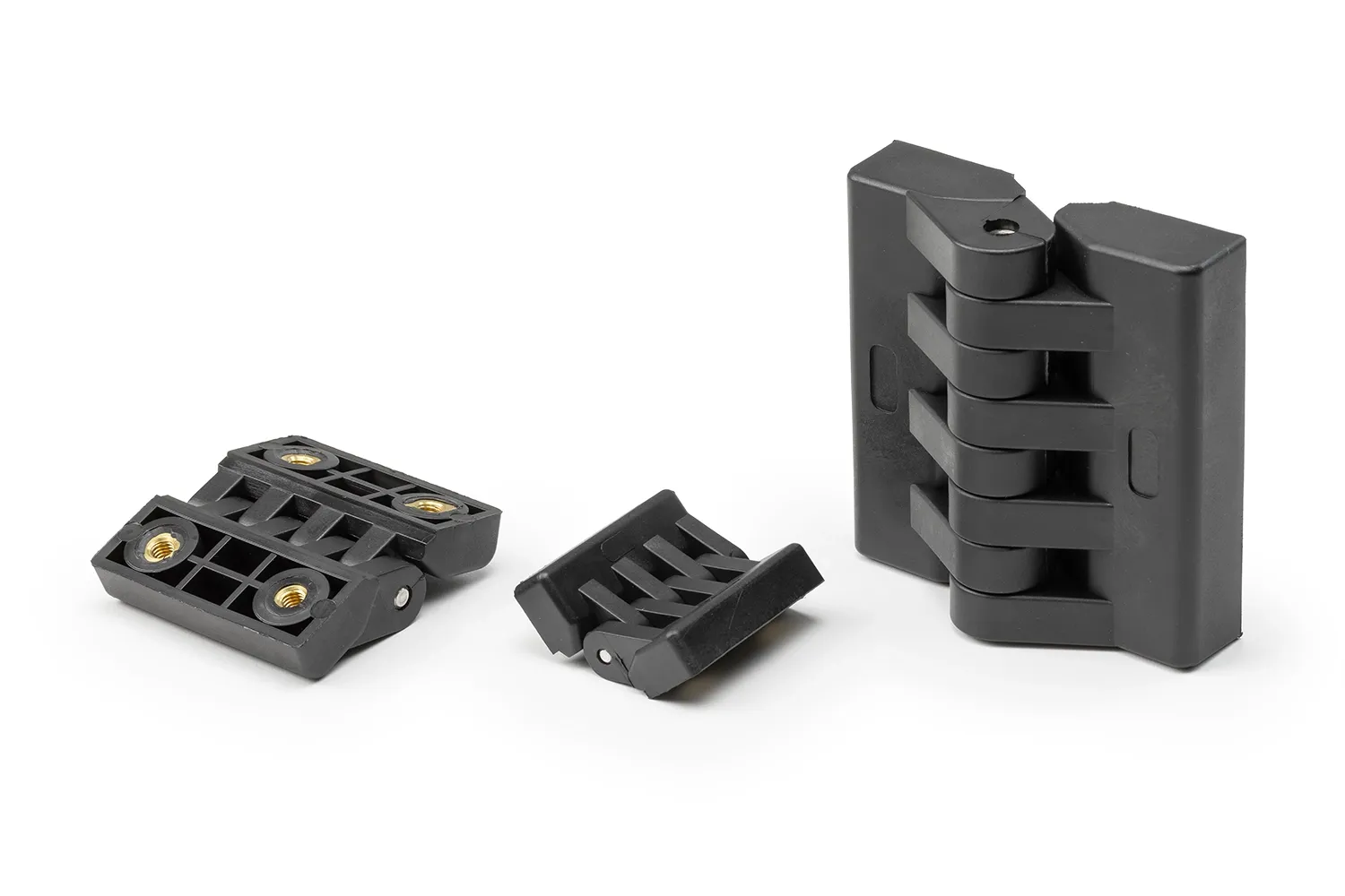 Three black hinges with bushings, of different sizes, arranged on a neutral background.