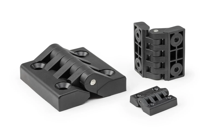 Three black hinges with through holes, of different sizes, arranged on a neutral background.