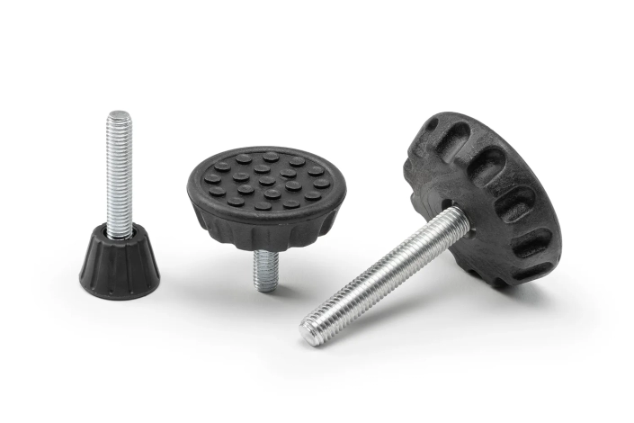 Three black fixed support feet with screws, in different sizes, arranged on a neutral background.
