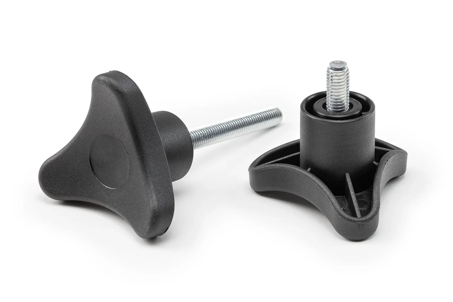 Two black 3-lobe handwheels with studs of different sizes, arranged on a neutral background.